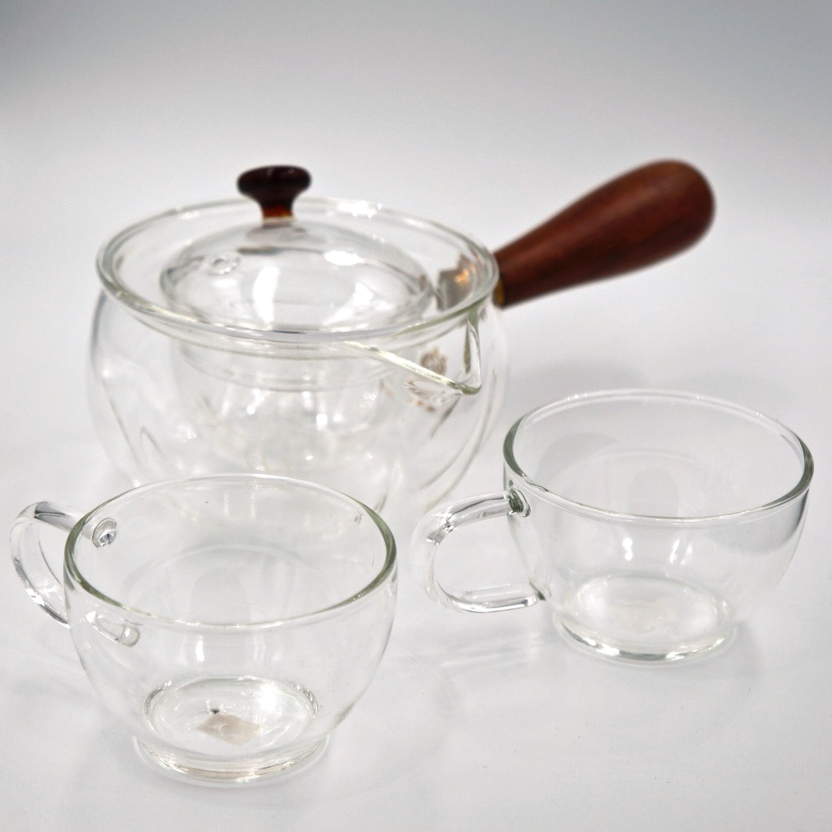 Glass Side Handle Tea Pot and Two Cups