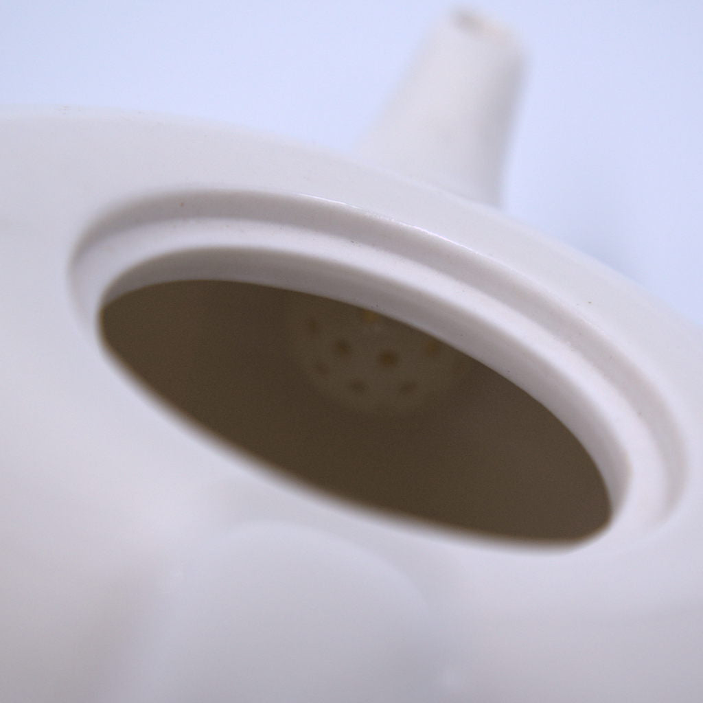 Apple Tea Pot detail view of interior strainer