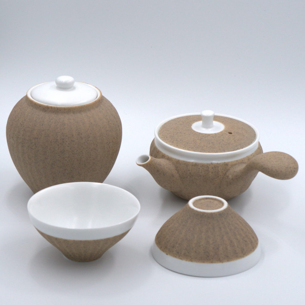 Tea Set with tea pot, canister and cups